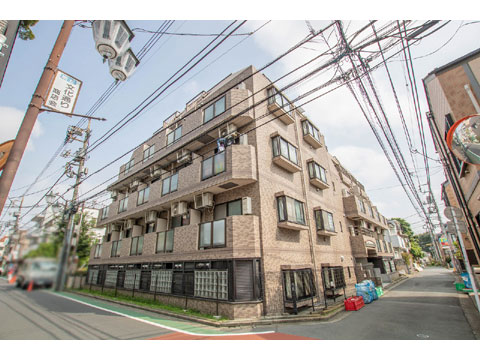 現地外観写真　外観タイル張のマンション